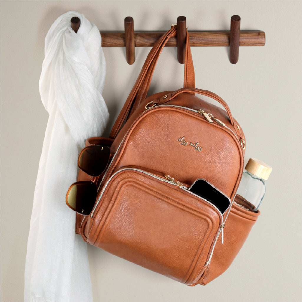 Cognac Itzy Mini Plus™ Diaper Bag